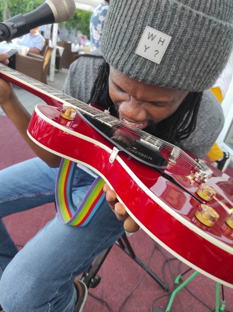 Lee shredding guitar