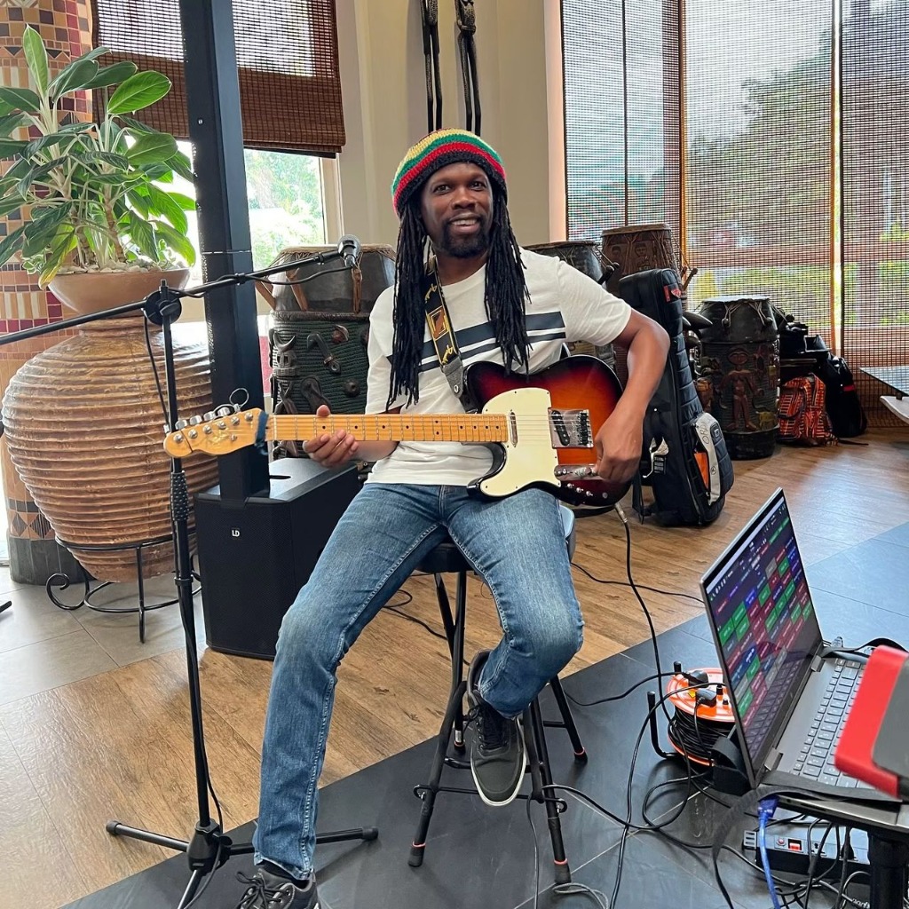 Lee Holness on guitar